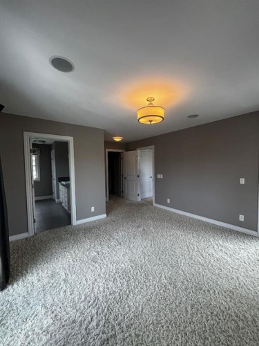 1 Murmansk Way Sw, Calgary, AB - Indoor Photo Showing Other Room