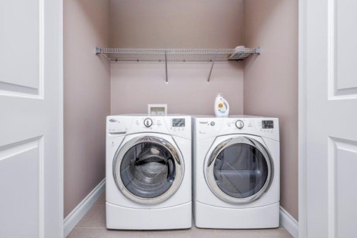 1 Murmansk Way Sw, Calgary, AB - Indoor Photo Showing Laundry Room