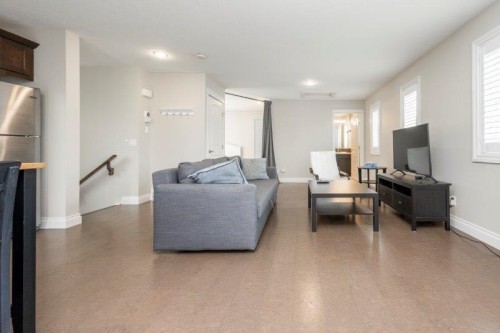 1 Murmansk Way Sw, Calgary, AB - Indoor Photo Showing Living Room