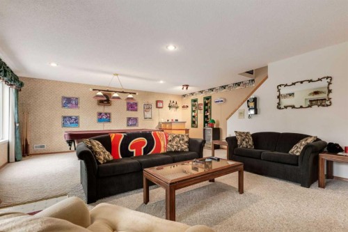 24 Sunmeadows Court Se, Calgary, AB - Indoor Photo Showing Living Room