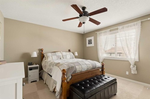 417 Silverado Boulevard Sw, Calgary, AB - Indoor Photo Showing Bedroom