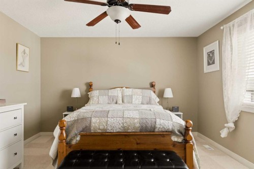 417 Silverado Boulevard Sw, Calgary, AB - Indoor Photo Showing Bedroom