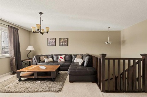 417 Silverado Boulevard Sw, Calgary, AB - Indoor Photo Showing Living Room