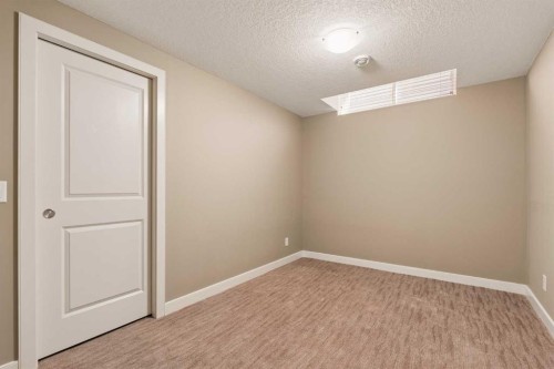 417 Silverado Boulevard Sw, Calgary, AB - Indoor Photo Showing Other Room