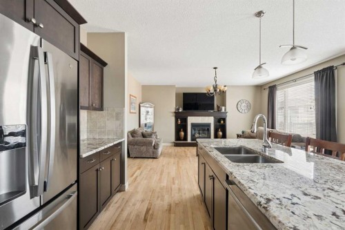 417 Silverado Boulevard Sw, Calgary, AB - Indoor Photo Showing Kitchen With Stainless Steel Kitchen With Double Sink With Upgraded Kitchen