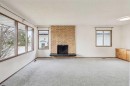 1260 Lake Sylvan Drive Se, Calgary, AB  - Indoor Photo Showing Other Room With Fireplace 