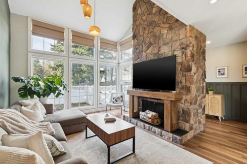 57-28 Berwick Crescent Nw, Calgary, AB - Indoor Photo Showing Living Room With Fireplace