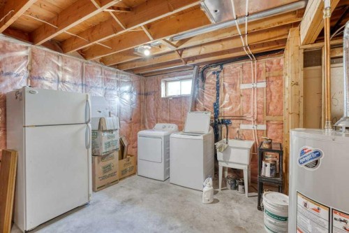79 Riverview Circle, Cochrane, AB - Indoor Photo Showing Laundry Room