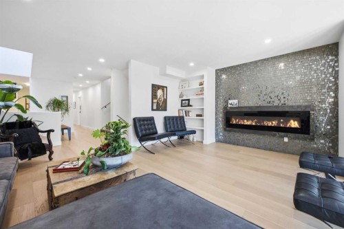 3817 18 Street Sw, Calgary, AB - Indoor Photo Showing Living Room With Fireplace