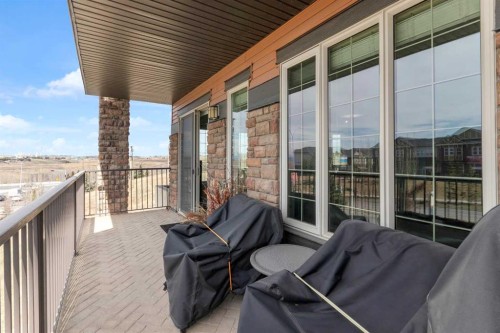 2101-15 Sunset Square, Cochrane, AB - Outdoor With Deck Patio Veranda With Exterior
