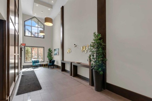 2101-15 Sunset Square, Cochrane, AB - Indoor Photo Showing Other Room
