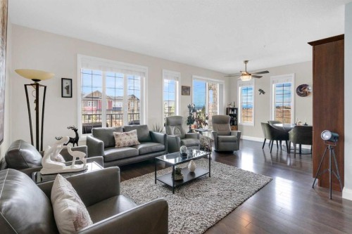 2101-15 Sunset Square, Cochrane, AB - Indoor Photo Showing Living Room
