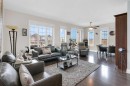 2101-15 Sunset Square, Cochrane, AB  - Indoor Photo Showing Living Room 