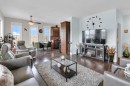 2101-15 Sunset Square, Cochrane, AB  - Indoor Photo Showing Living Room 