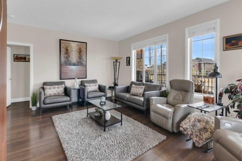 2101-15 Sunset Square, Cochrane, AB - Indoor Photo Showing Living Room