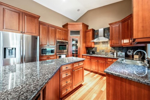 212 Aspen Meadows Place Sw, Calgary, AB - Indoor Photo Showing Kitchen With Double Sink With Upgraded Kitchen
