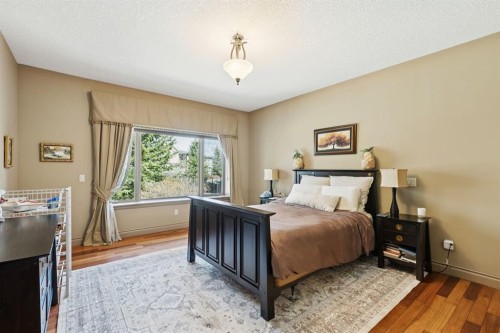 212 Aspen Meadows Place Sw, Calgary, AB - Indoor Photo Showing Bedroom