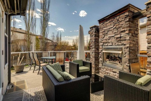 128 Tuscany Vista Crescent Nw, Calgary, AB - Outdoor With Fireplace With Exterior
