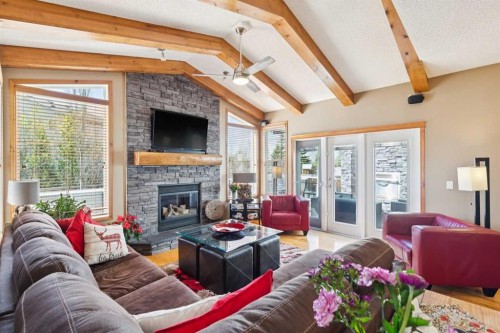 128 Tuscany Vista Crescent Nw, Calgary, AB - Indoor Photo Showing Living Room With Fireplace