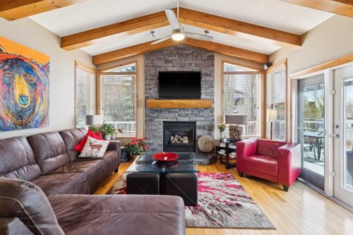 128 Tuscany Vista Crescent Nw, Calgary, AB - Indoor Photo Showing Living Room With Fireplace