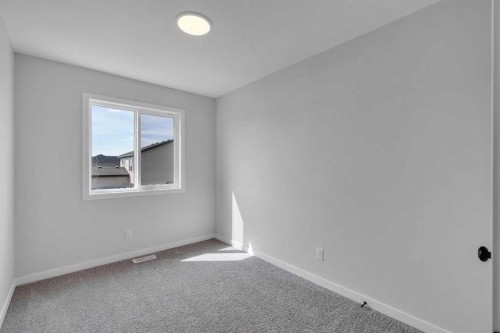 237 Heirloom Way Se, Calgary, AB - Indoor Photo Showing Other Room