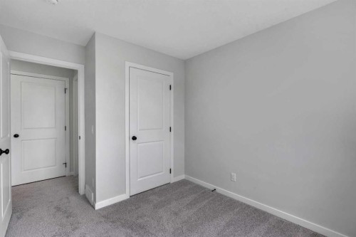 237 Heirloom Way Se, Calgary, AB - Indoor Photo Showing Other Room