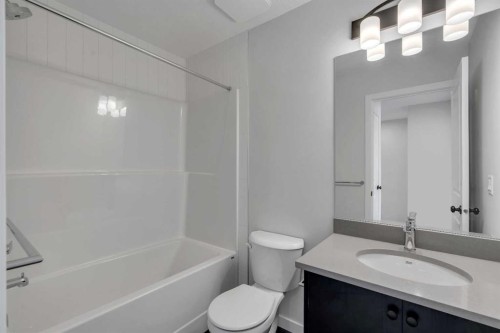 237 Heirloom Way Se, Calgary, AB - Indoor Photo Showing Bathroom