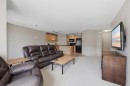 18 Auburn Bay Common Se, Calgary, AB  - Indoor Photo Showing Living Room 