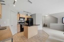 18 Auburn Bay Common Se, Calgary, AB  - Indoor Photo Showing Kitchen With Double Sink 