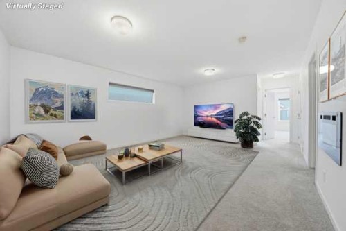 324 Copperhead Way Se, Calgary, AB - Indoor Photo Showing Living Room