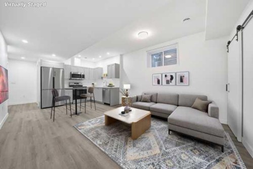 324 Copperhead Way Se, Calgary, AB - Indoor Photo Showing Living Room