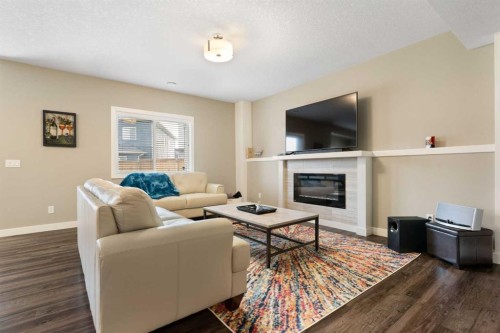 71 Sherview Grove Nw, Calgary, AB - Indoor Photo Showing Living Room With Fireplace