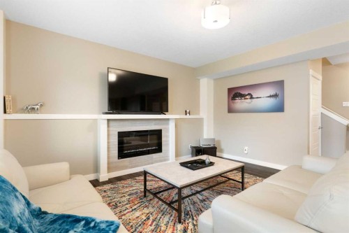 71 Sherview Grove Nw, Calgary, AB - Indoor Photo Showing Living Room With Fireplace