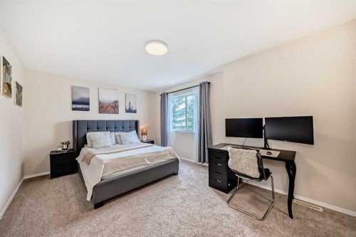 103 Everstone Place Sw, Calgary, AB - Indoor Photo Showing Bedroom