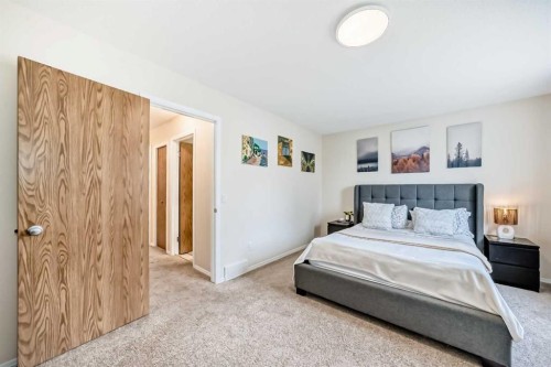 103 Everstone Place Sw, Calgary, AB - Indoor Photo Showing Bedroom