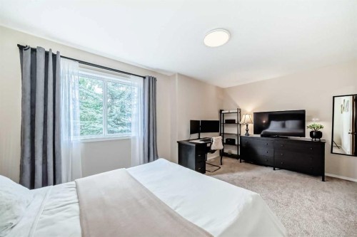 103 Everstone Place Sw, Calgary, AB - Indoor Photo Showing Bedroom