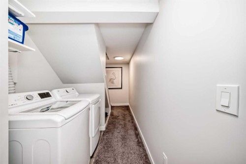 103 Everstone Place Sw, Calgary, AB - Indoor Photo Showing Laundry Room