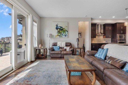 369 Marquis Landing Se, Calgary, AB - Indoor Photo Showing Living Room