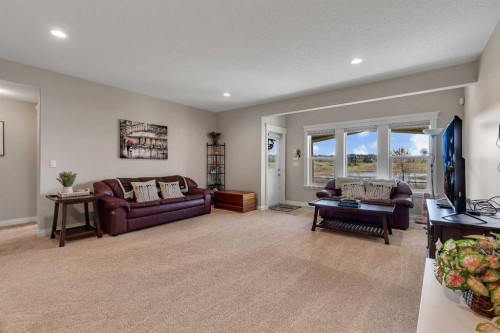 369 Marquis Landing Se, Calgary, AB - Indoor Photo Showing Living Room