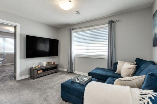 144 Wolf Willow Boulevard Se, Calgary, AB - Indoor Photo Showing Living Room