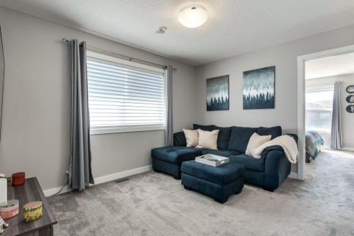 144 Wolf Willow Boulevard Se, Calgary, AB - Indoor Photo Showing Living Room