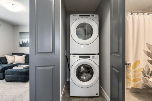 144 Wolf Willow Boulevard Se, Calgary, AB - Indoor Photo Showing Laundry Room