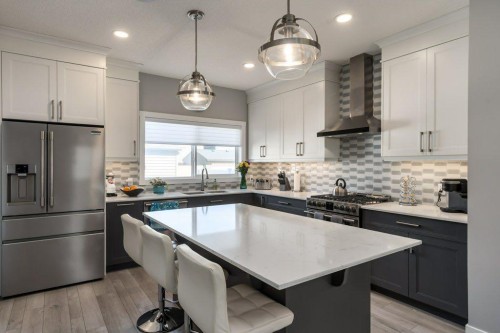 144 Wolf Willow Boulevard Se, Calgary, AB - Indoor Photo Showing Kitchen With Stainless Steel Kitchen With Upgraded Kitchen