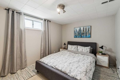 19 Hyslop Drive Sw, Calgary, AB - Indoor Photo Showing Bedroom