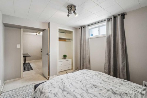 19 Hyslop Drive Sw, Calgary, AB - Indoor Photo Showing Bedroom