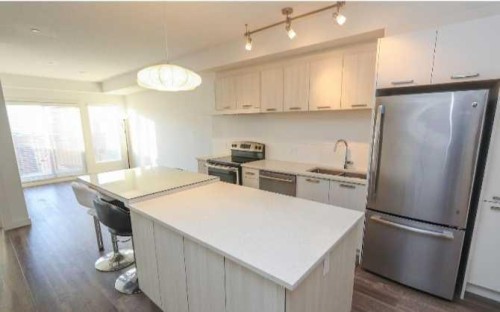 308-730 5 Street Ne, Calgary, AB - Indoor Photo Showing Kitchen With Stainless Steel Kitchen With Upgraded Kitchen