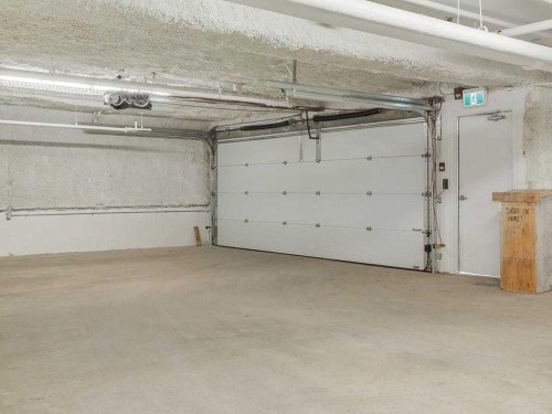 308-730 5 Street Ne, Calgary, AB - Indoor Photo Showing Garage