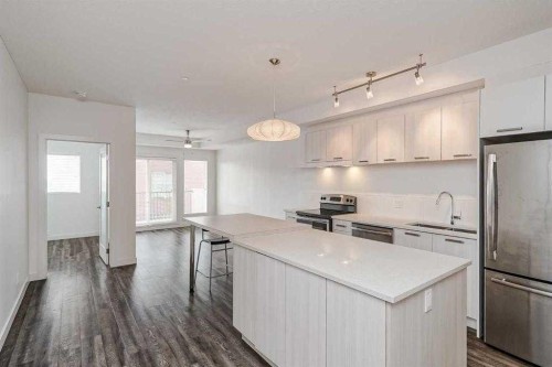 308-730 5 Street Ne, Calgary, AB - Indoor Photo Showing Kitchen With Stainless Steel Kitchen With Upgraded Kitchen