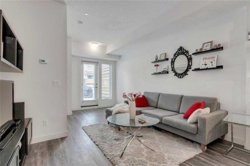 308-730 5 Street Ne, Calgary, AB - Indoor Photo Showing Living Room