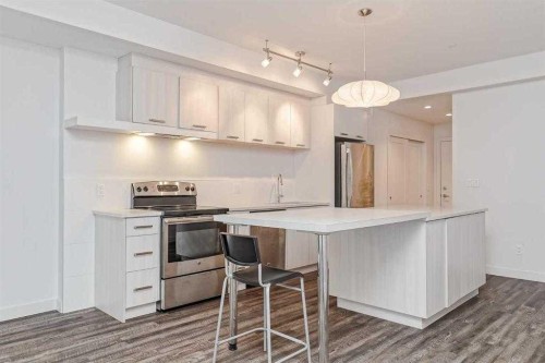 308-730 5 Street Ne, Calgary, AB - Indoor Photo Showing Kitchen With Stainless Steel Kitchen With Upgraded Kitchen